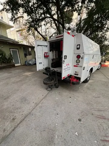 Magnet Plumbing service vehicle on-site for Water Heater Repair in Northwest Santa Ana